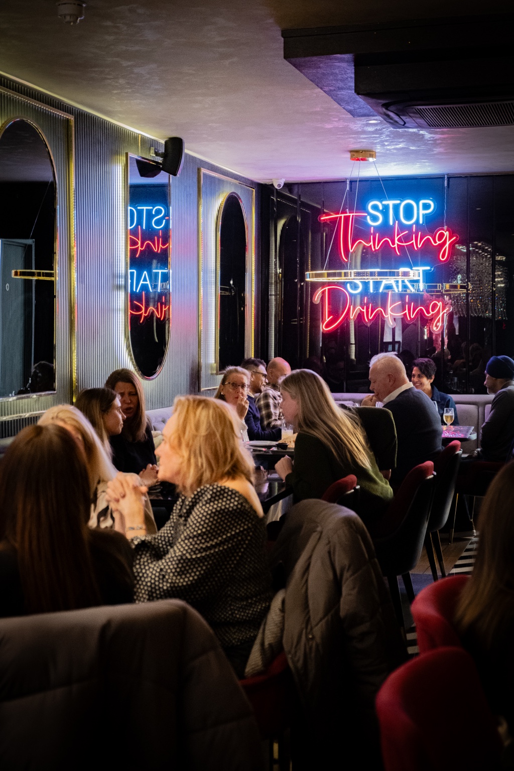 Guests enjoying an evening in a lively restaurant